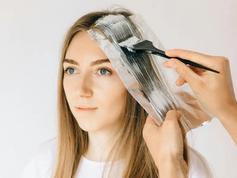 Hair coloring and highlights for vibrant, glossy hair in Nashik